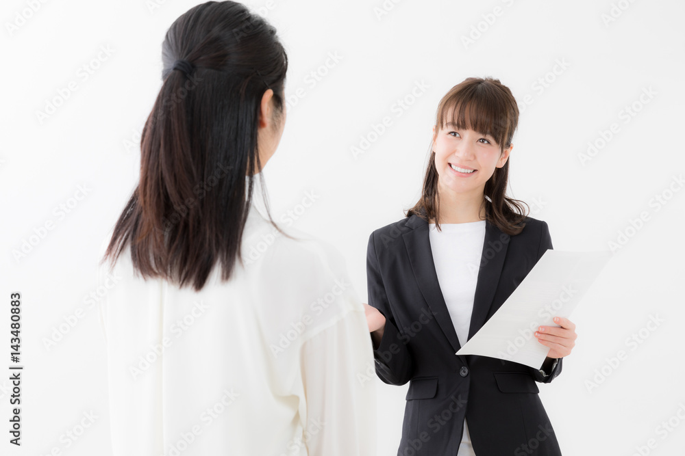 asian businesswomen talking on white background asian businesswomen talking on white background