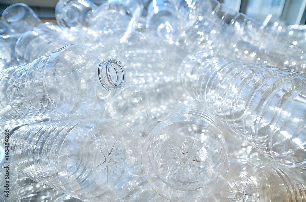 Bottle. Industrial production of plastic pet bottles. Factory line for manufacturing polyethylene bottles. Transparent food packaging Bottle. Industrial production of plastic pet bottles. Factory line for manufacturing polyethylene bottles. Transparent food packaging