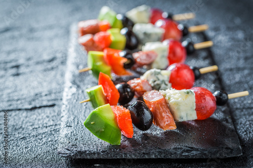 Billede på lærred Closeup of tasty finger food with vegetables and herbs