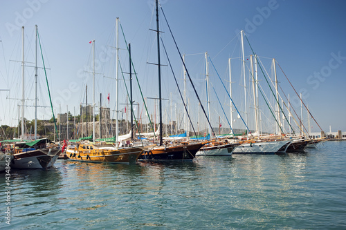 Bodrum harbor with traditional wooden boats and castle Turkey