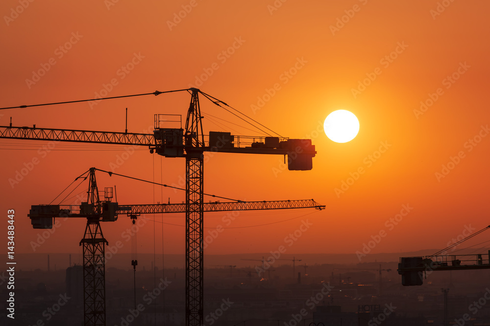 Crane over the urban landscape real estate development