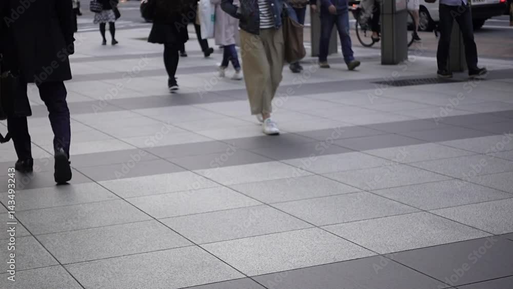 Businessman and Young People walking at super slow motion
Businessman and Young People walking at super slow motion