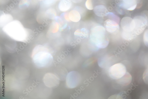 Glittering festive silver white blank blurry bokeh background