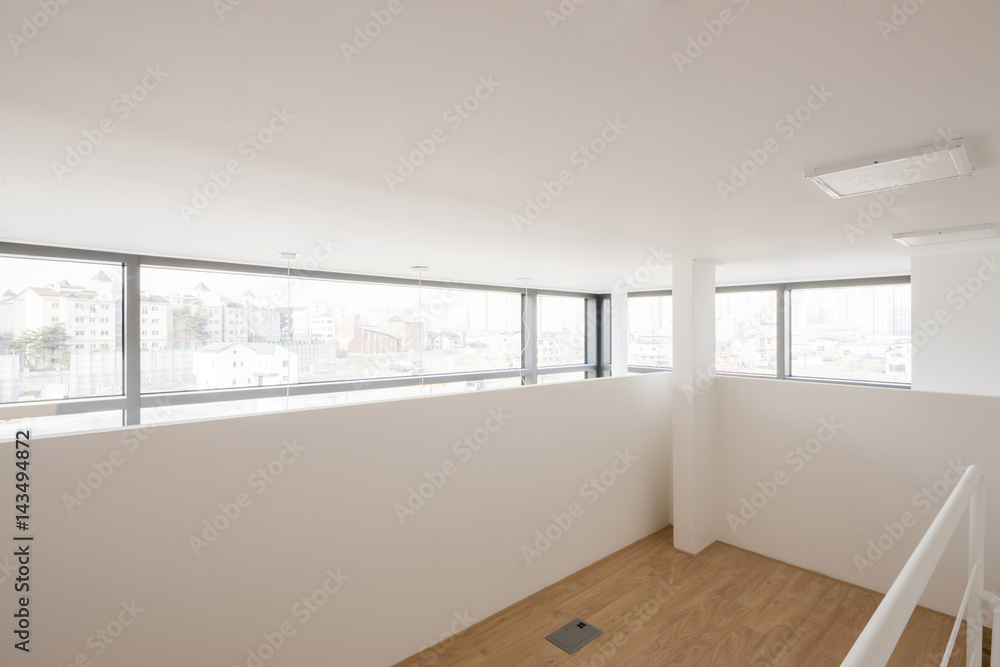 empty white room with window at the daylight. empty white room with window at the daylight.