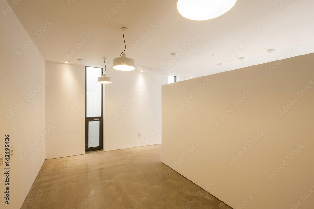 white empty office, showroom with pendant lighting, window. white empty office, showroom with pendant lighting, window.