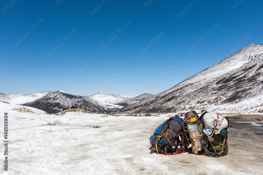 pilgrims backpack with snow mountain