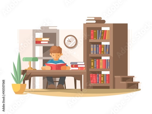Student reads book in library