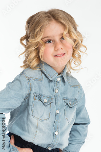 Pretty blonde kid on white background