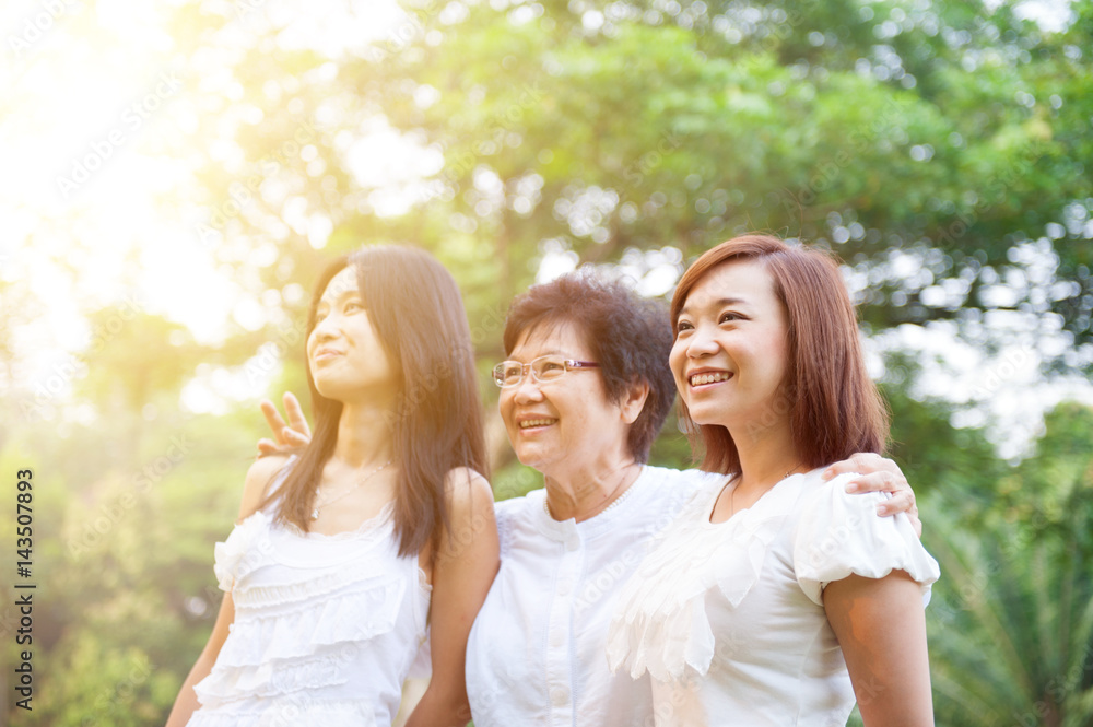 Asian mother and grown daughters Asian mother and grown daughters