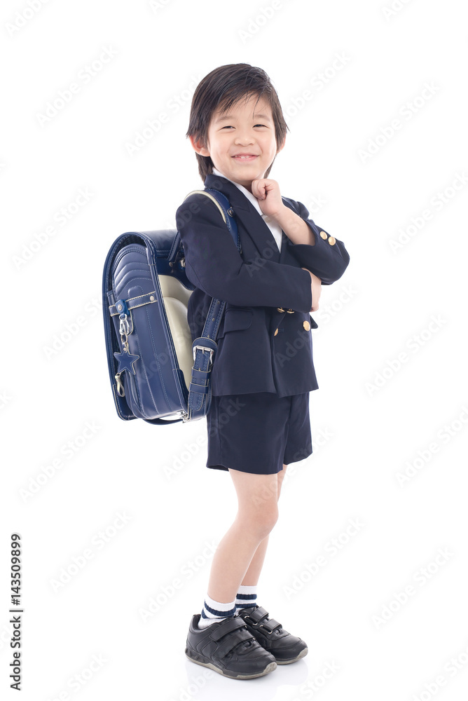 Asian child in school uniform with blue school bag Asian child in school uniform with blue school bag