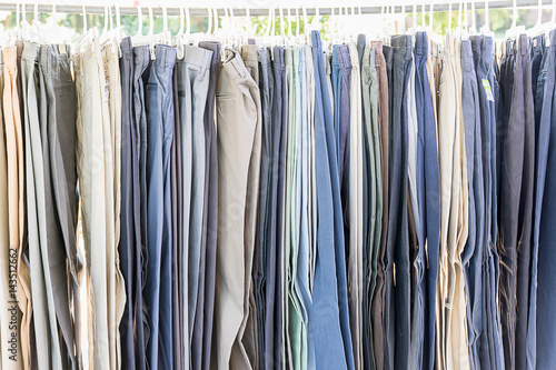 Row of old various woolen trousers © Singha songsak