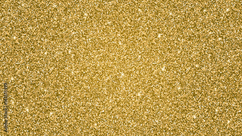 Abstract shiny gold glitter background. Bright substrate, a template for greeting cards, advertisements, invitations and any of your design.