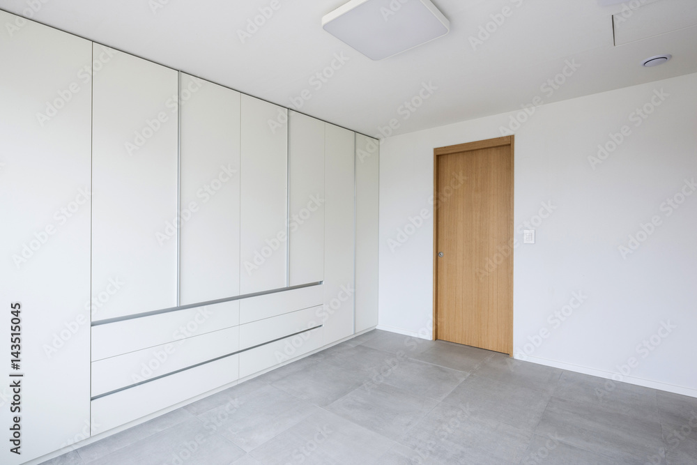 white empty room with window, wardrobe, door at the day. white empty room with window, wardrobe, door at the day.