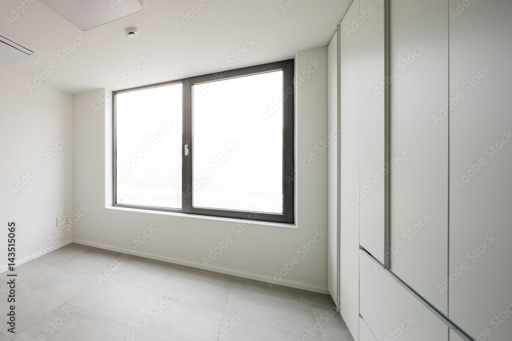 white empty room with window, wardrobe, door at the day. white empty room with window, wardrobe, door at the day.