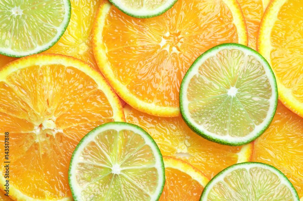 Fototapeta premium Orange and lime slices background