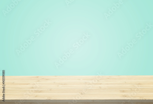 Laminate table top on pastel light blue background can put or montage your products