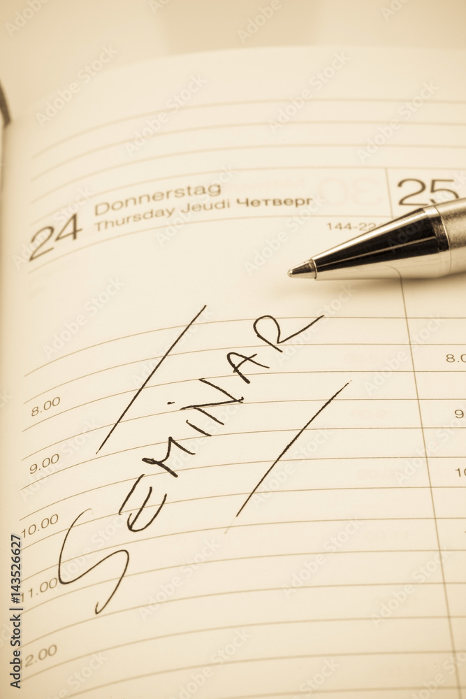 Eintrag im Kalender: Seminar Stock-Foto  Adobe Stock