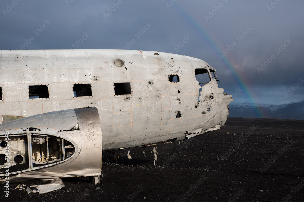 Wreck of the Dakota plane with rainbow, Iceland