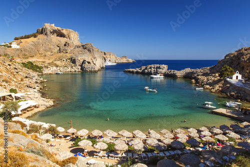 Panoramic view of Lindos st, Paul's bay and Acropolis, Rhodes, Greece