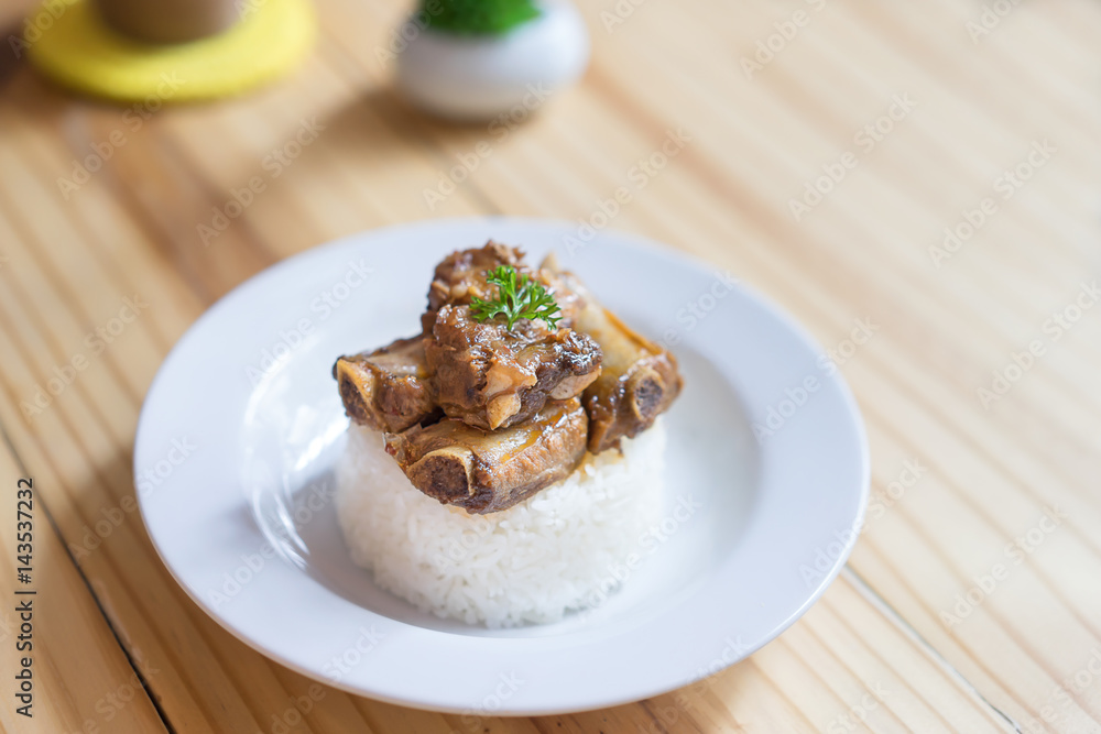 Rice with braised pork spare ribs.