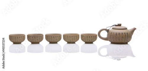 Traditional tea ceremony accessories  teapot and teacup with white background