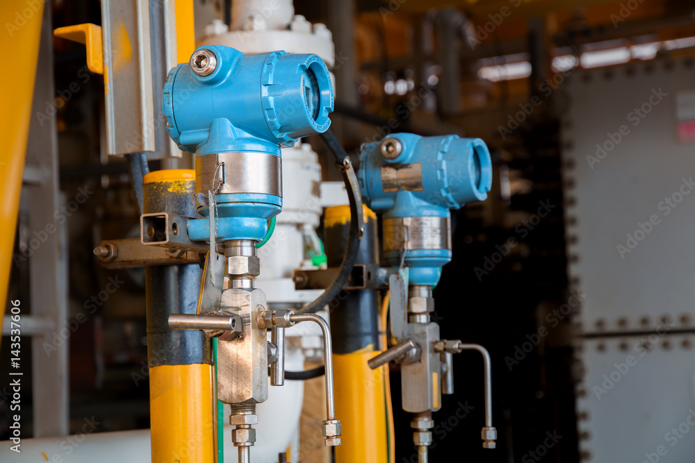 Pressure transmitter in oil and gas process, Send signal to controller and reading pressure in the system, Electronic transducer and sent data from production process to Processor Logic Controller. Pressure transmitter in oil and gas process, Send signal to controller and reading pressure in the system, Electronic transducer and sent data from production process to Processor Logic Controller.