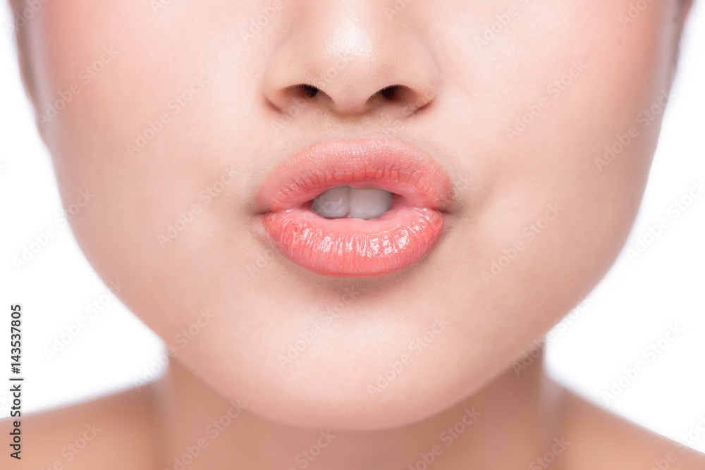 Young asian woman close up. Perfect natural lip makeup Young asian woman close up. Perfect natural lip makeup