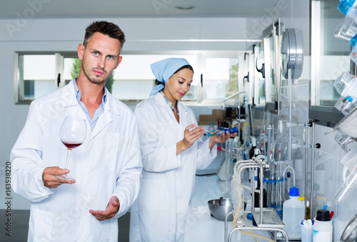 Man in chemical laboratory on winery