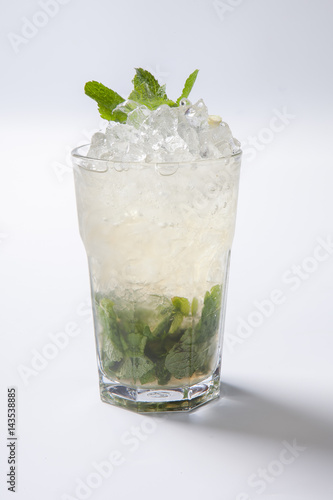 Cocktail mojito in front of white background