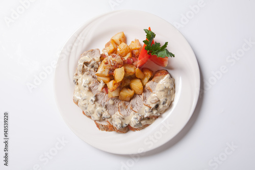 Fresh sliced chicken with roasted potato and mushroom souce