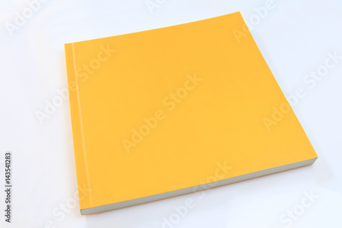 Yellow book on white background