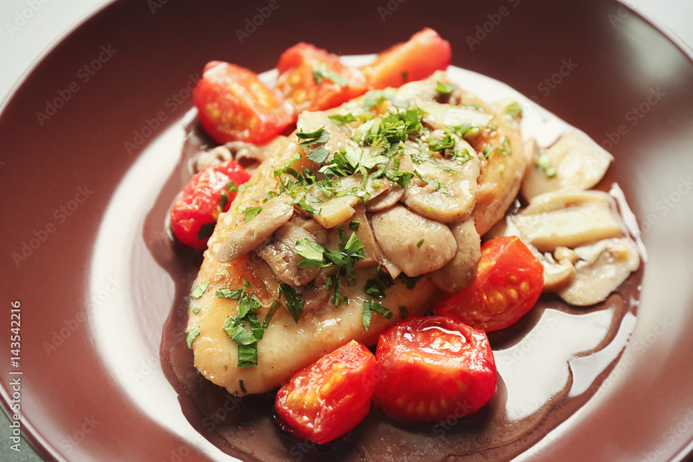 Tasty chicken marsala with mushrooms and tomatoes, closeup