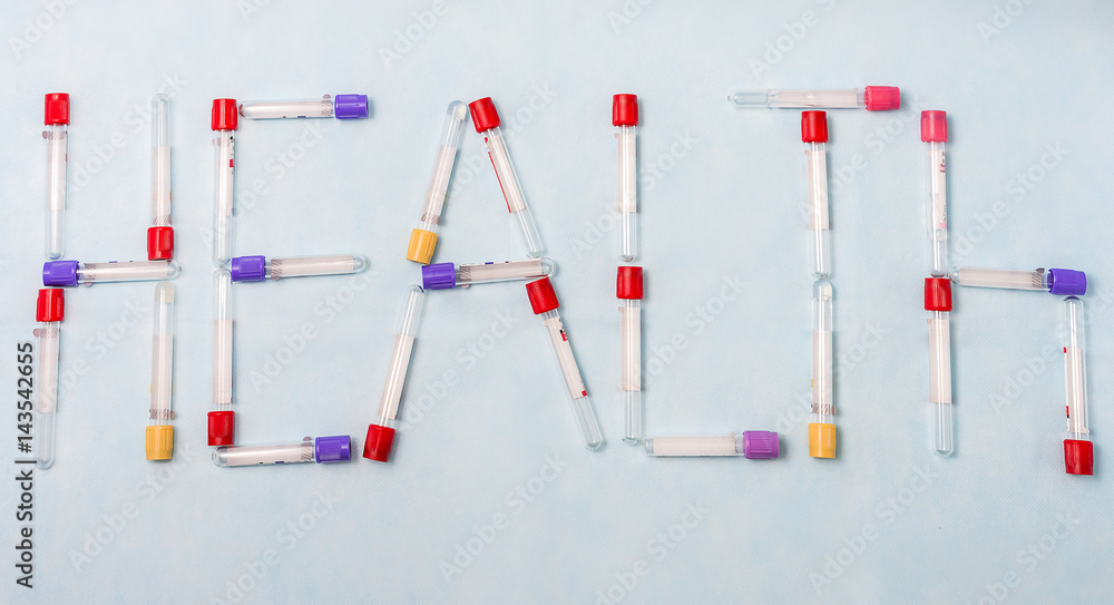 Test tubes for laboratory diagnosis, for blood tests оn a blue background . From the test tubes, the word Test tubes for laboratory diagnosis, for blood tests оn a blue background . From the test tubes, the word