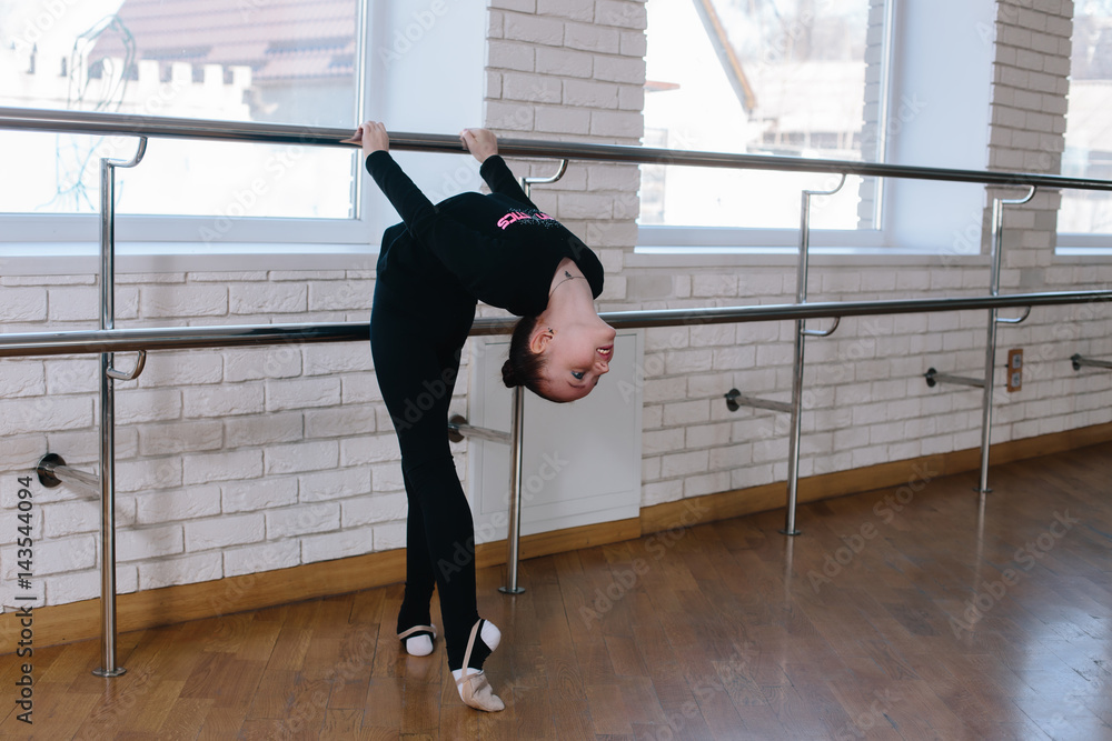 Fototapeta premium A modern gymnast in a dance class.