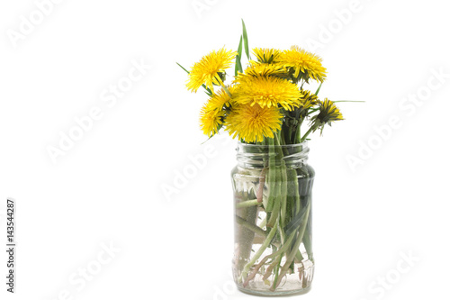 Fototapeta Naklejka Na Ścianę i Meble -  Simple bouquet of yellow spring dandelions