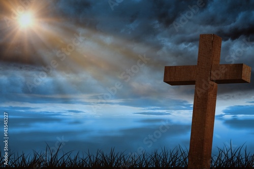 Composite image of wooden cross