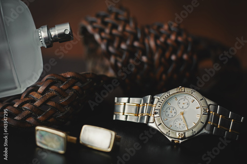 men's accessories. Perfume with watch and cuff