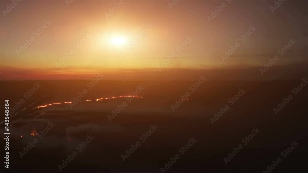 Aerial fire fields night 4k. Burning fields at night. Large-scale fire, the view from the top. The camera flies through the thick smoke. Smog in a large area Aerial fire fields night 4k. Burning fields at night. Large-scale fire, the view from the top. The camera flies through the thick smoke. Smog in a large area