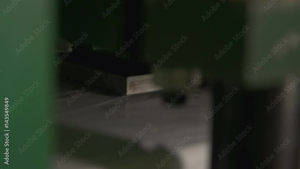 Macro Automatic Machine Makes Hole in Plastic Detail Macro Automatic Machine Makes Hole in Plastic Detail