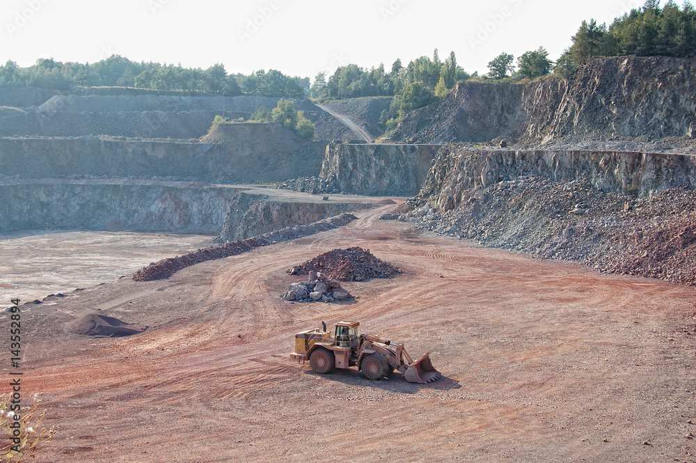 Fototapeta premium view into a quarry mine of porphyry rock
