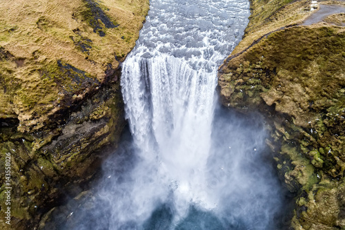 Aerial view waterfall near of famous Skogar waterfall in Iceland.