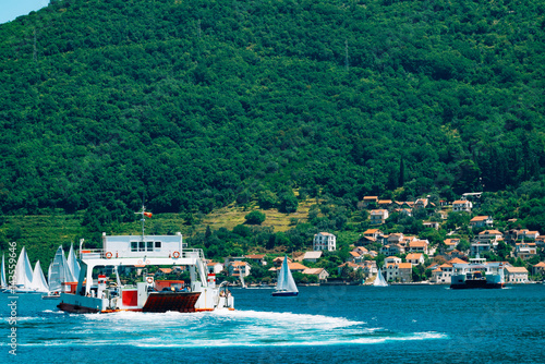 A ferry in the Boka Bay of Kotor in Montenegro, from Lepetane to Kamenari. Car ferry across the bay.