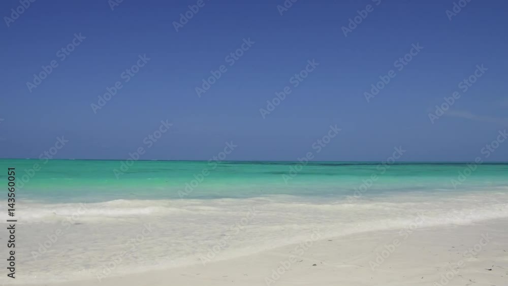 beach on indian ocean shore in zanzibar, tanzania beach on indian ocean shore in zanzibar, tanzania