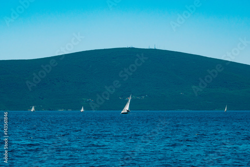 Sailing regatta in Montenegro. Regatta on yachts in the Boka Bay of Kotor in the Adriatic Sea. Sports competitions on yachts.