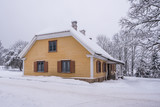 old wooden house in Turaida castle park during the winter. Winter landscape. Sigulda Latvia
