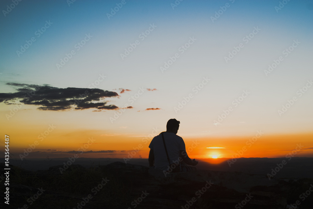 Man silhouette at sunset in Brazil Man silhouette at sunset in Brazil