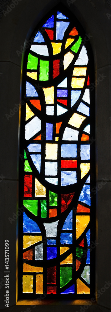Church's stained glass window. Vertical
