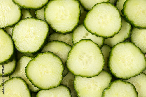 Fresh cucumber slices background