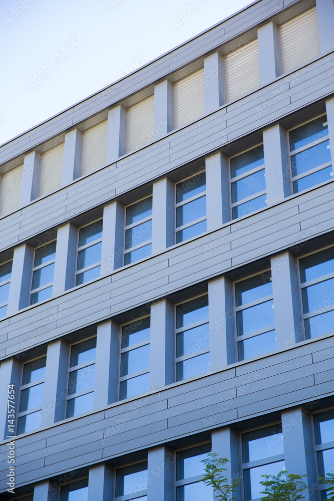 Office buildings in cityscape with a sky blue Office buildings in cityscape with a sky blue