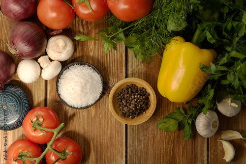 Ingredients for salad on a wooden background ,Tomat, paprika, Salad vegetables
